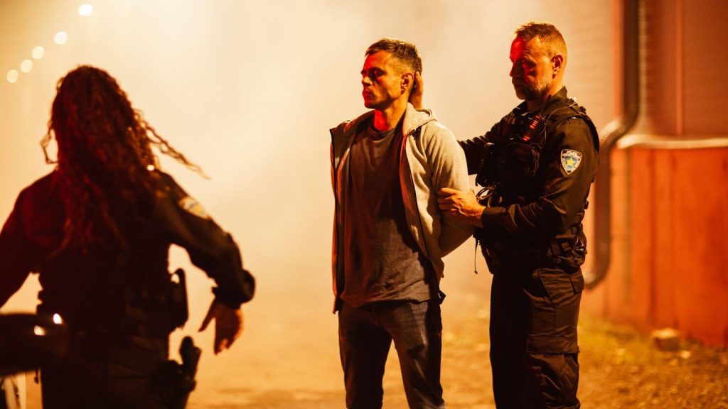 Security-personnel-detaining-a-suspect-at-night-demonstrating-proactive-response-capabilities.