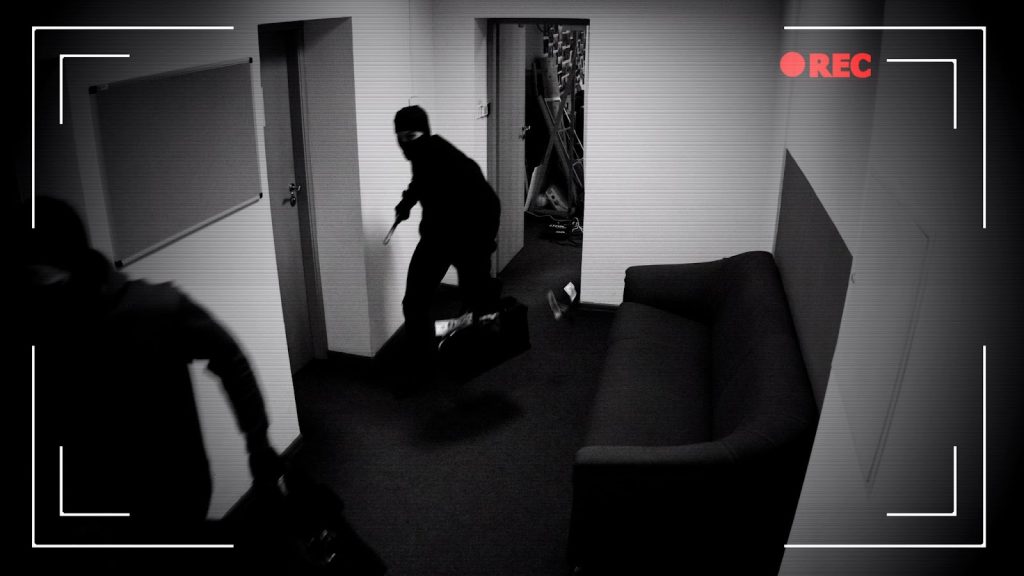 Intruders caught on camera by a video verification alarm system during a security breach.