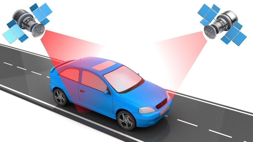 Car with GPS tracking signals from satellites on a road.