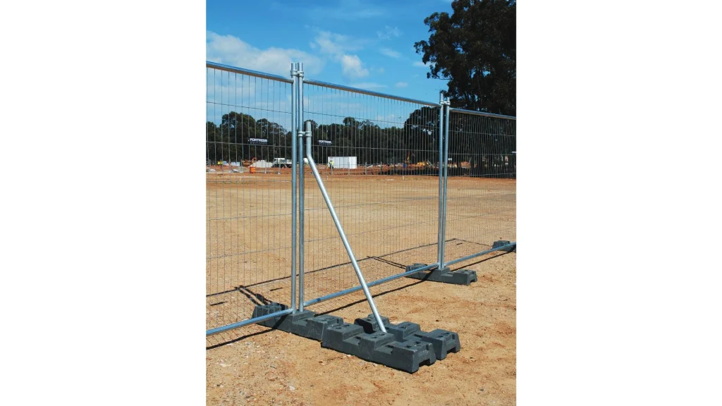 Temporary fencing installed at a construction site to secure the perimeter and prevent unauthorized access.
