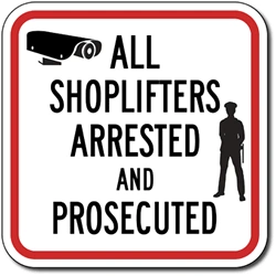 Warning sign showing CCTV camera and message that all shoplifters will be arrested and prosecuted